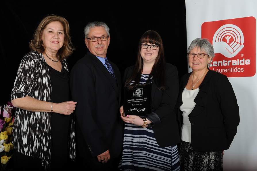 Doug and Donna Sharpe along with Megan Beaulieu and Suzanne Piché, General Manager of Centraide Laurentides.